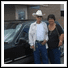 Couple With Newly Painted Vehicle